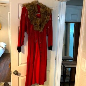 Suede long coat by Liz E Parker. ￼ Great condition, real fur